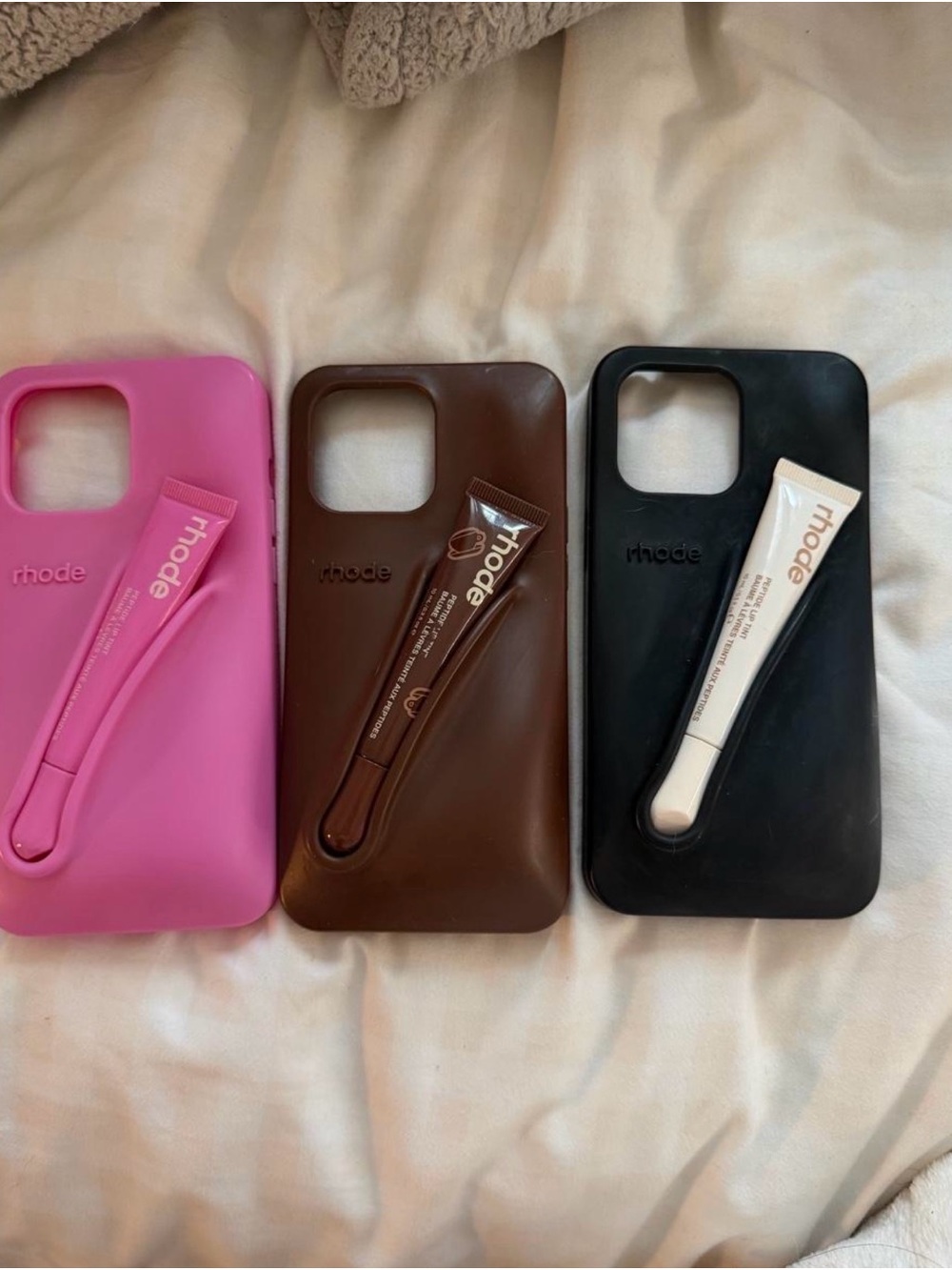 RHODE Silicone Phone Case with Built-In Tube Holder — Pink, Brown, Black